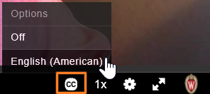 A detail screenshot of a Kaltura video. The "CC" button is outlined in orange and has been clicked on to show the caption options for a video. The cursor hovers over "English (American)"