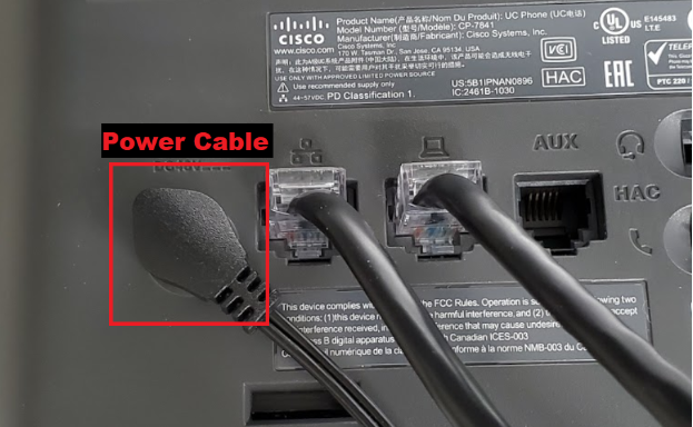 shows the power cable plugged into the back of the cisco phone labeled as Power Cable